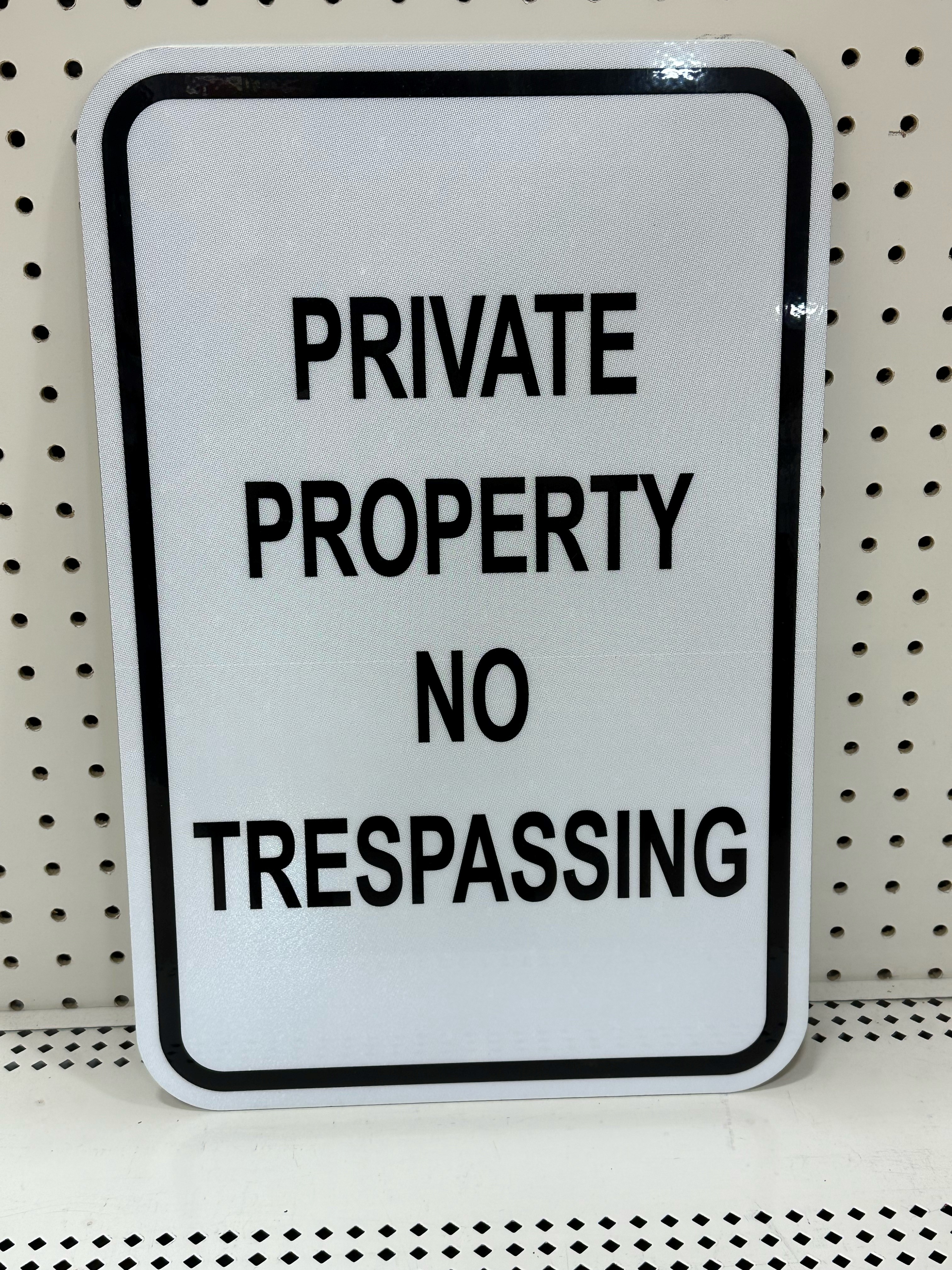 SIGN, "PRIVATE PROPERTY NO TRESPASSING"